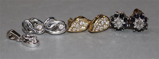 A pair of 18ct white gold and diamond double hoop earrings, a matching pendant and two other pairs of earrings